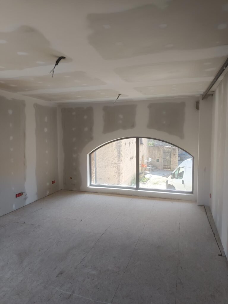 Isolation, réalisation bandes à joint, installation fenêtre